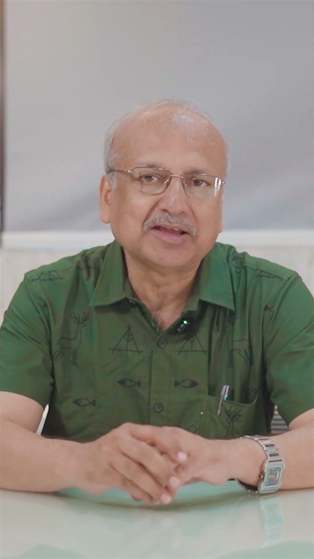 Dr. Pradip Mitra speaking to camera in a Medmatis client story video